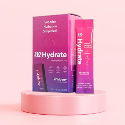 310 hydrate electrolyte drink mix packet on pink background