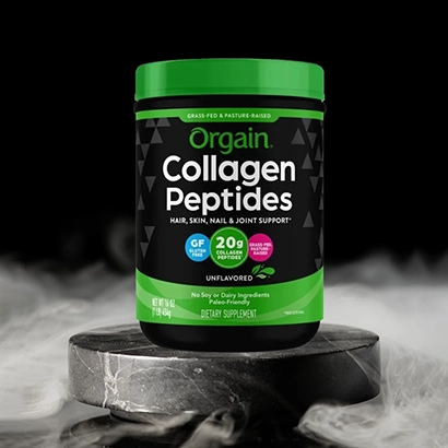 Orgain collagen peptides on marble dark smoky background